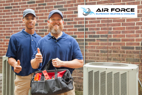 Happy Air Force HVAC Corp technicians after Air conditioner installation